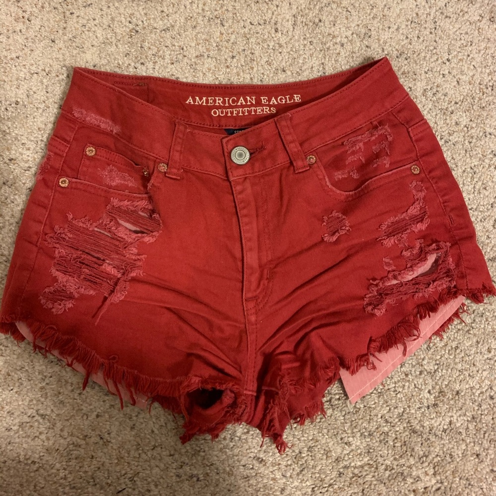 american eagle red ripped shorts